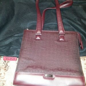 Tumi hand bag